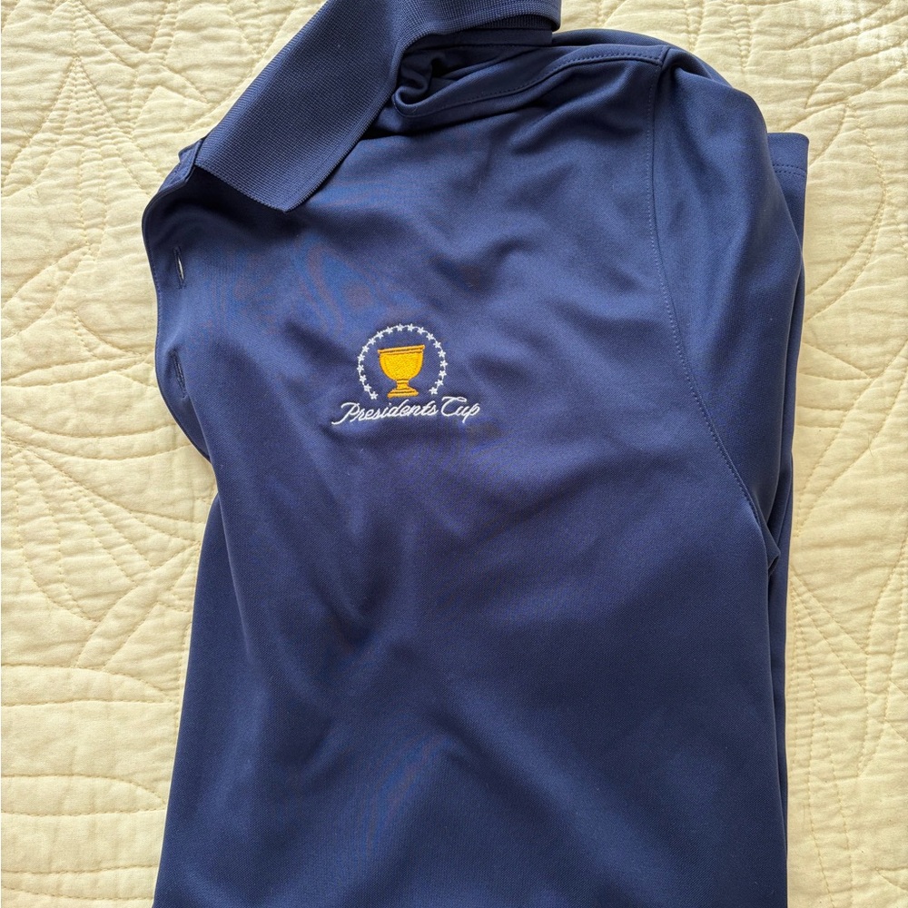 Nike Golf Black Polo with Gold Branding